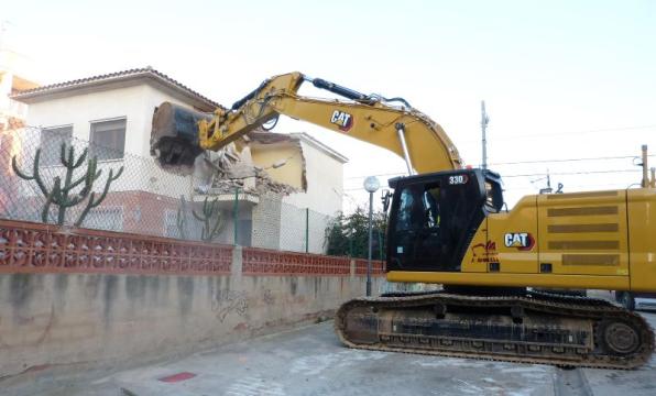 Imatge de la demolició d'un dels 21 habitatges afectats