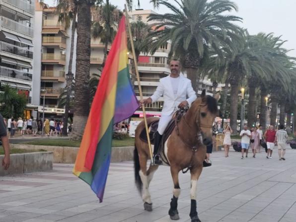 The Rainbow Flag Arrives on Horseback at the Proud of Salou Festival